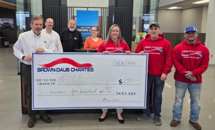 Pictured L to R: Thomas A. Daub, Brown-Daub; Willie Nelson, Brown-Daub; Scott Geary, Brown-Daub; Chrissy Sitler, Brown-Daub; MaryAnn Irwin, LVCB; Justin Erwin, LVCB; Mike Miller, LVCB