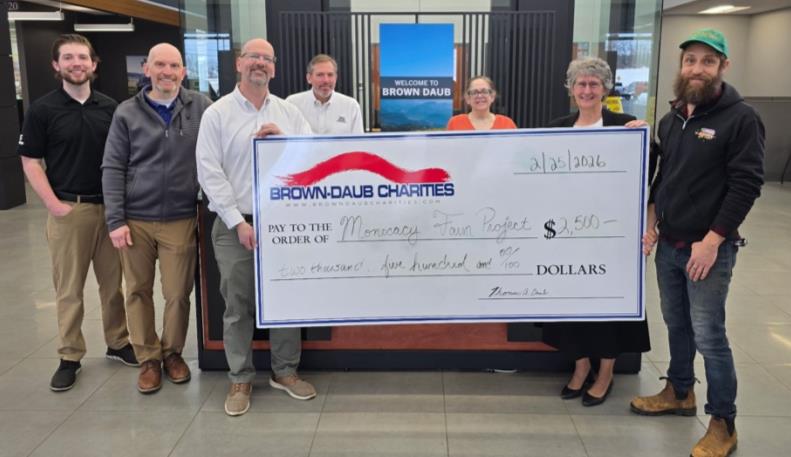 Pictured L to R: Mitch Wilson, Brown-Daub; Rich Wilson, Brown-Daub; Willie Nelson, Brown-Daub; Thomas A. Daub, Brown-Daub; Chrissy Sitler, Brown-Daub; Sister Bonnie Kleinschuster, MFP; Eli Stogsdill, MFP